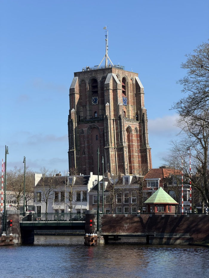 The Oldehove, the leaning tower of Leeuwarden, seen across the water